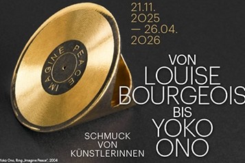 Ring auf schwarzem Grund und weiße Schrift.